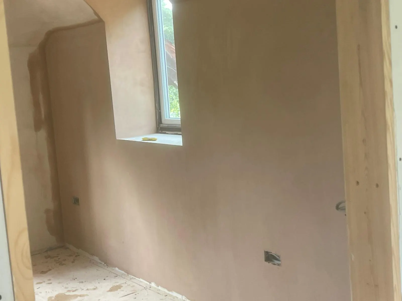 Plastering in progress — client-supplied L&G project photograph